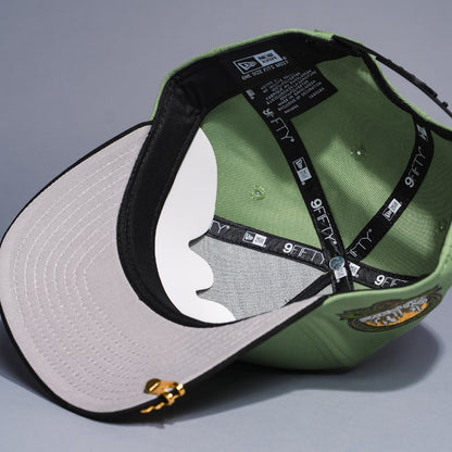 NEW ERA 9FIFTY A-FRAME LIGHT GREEN/BLACK ATLANTA BRAVES SNAPBACK W/ ANNIVERSARY SIDE PATCH