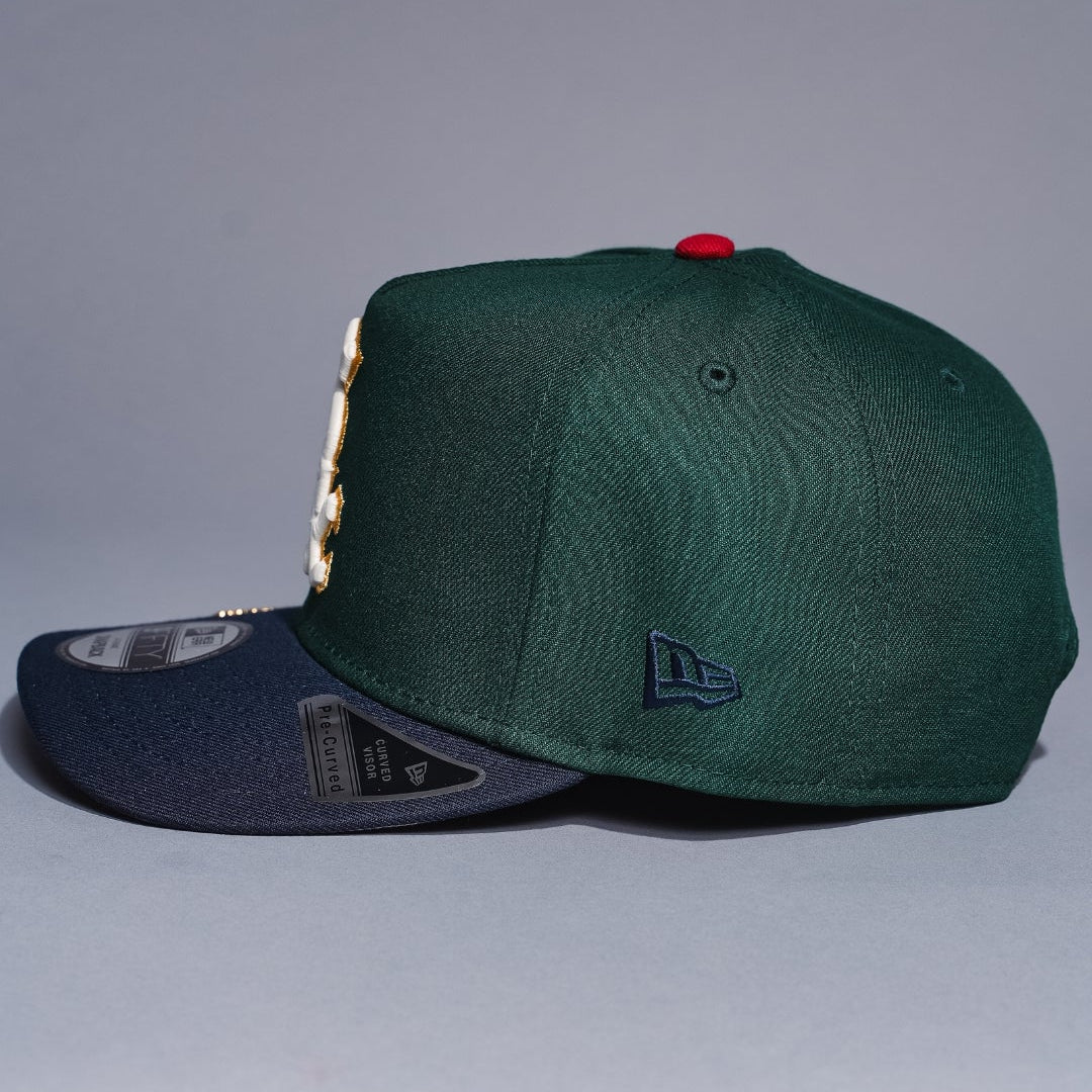 NEW ERA 9FIFTY A-FRAME FOREST GREEN/NAVY CHICAGO WHITE SOX SNAPBACK W/ ALL STAR GAME SIDE PATCH