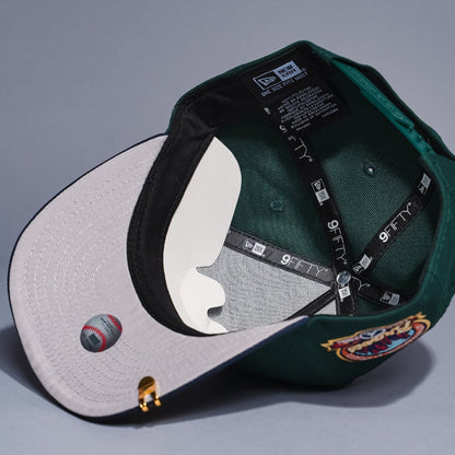 NEW ERA 9FIFTY A-FRAME FOREST GREEN/NAVY ATLANTA BRAVES SNAPBACK W/ ANNIVERSARY SIDE PATCH