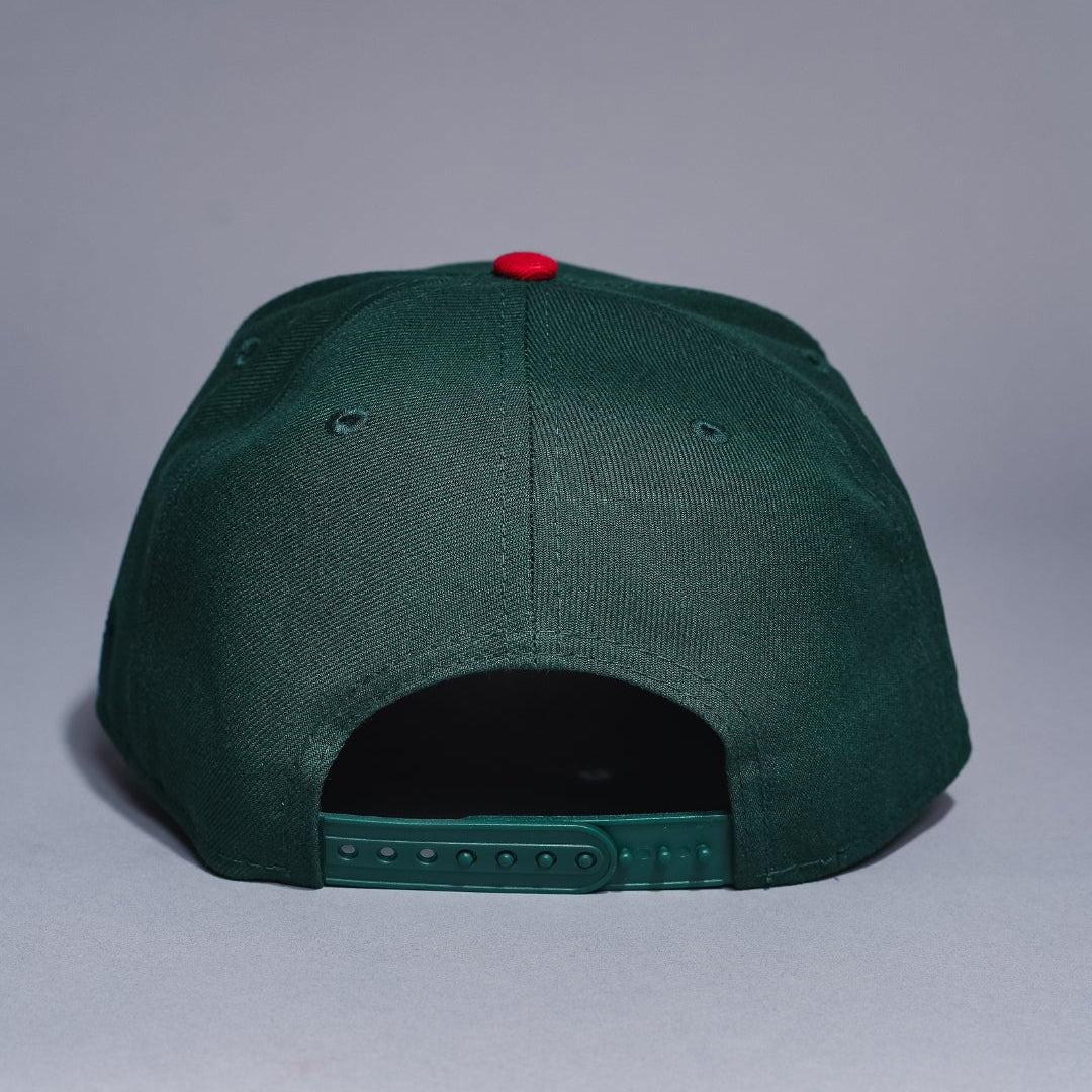 NEW ERA 9FIFTY A-FRAME FOREST GREEN/NAVY ATLANTA BRAVES SNAPBACK W/ ANNIVERSARY SIDE PATCH