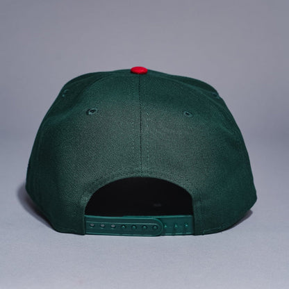 NEW ERA 9FIFTY A-FRAME FOREST GREEN/NAVY ATLANTA BRAVES SNAPBACK W/ ANNIVERSARY SIDE PATCH