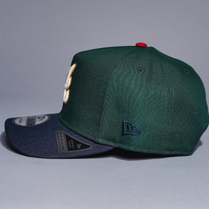 NEW ERA 9FIFTY A-FRAME FOREST GREEN/NAVY ATLANTA BRAVES SNAPBACK W/ ANNIVERSARY SIDE PATCH