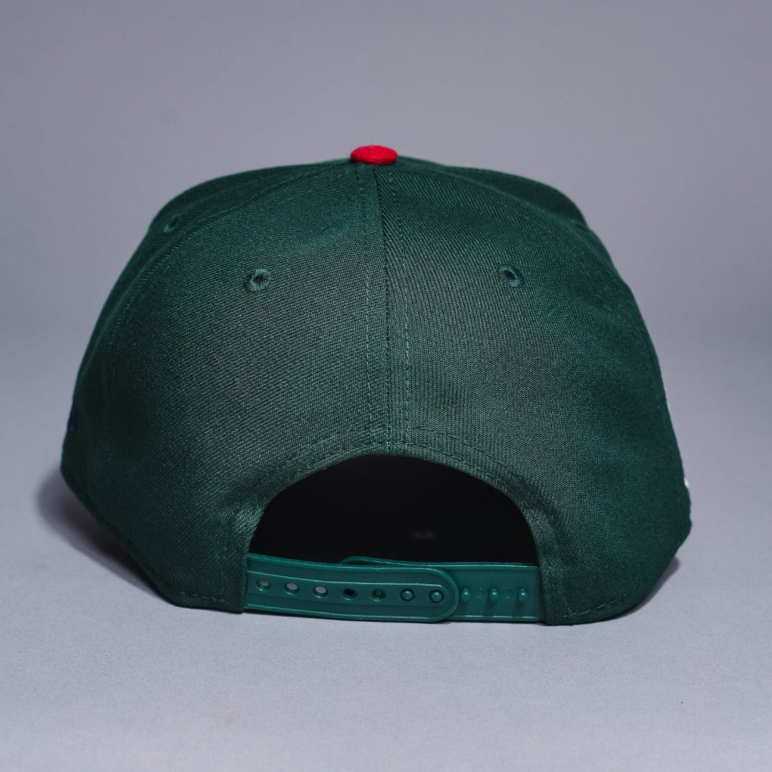 NEW ERA 9FIFTY A-FRAME FOREST GREEN/NAVY TEXAS RANGERS SNAPBACK W/ 2020 INAUGURAL SEASON SIDE PATCH