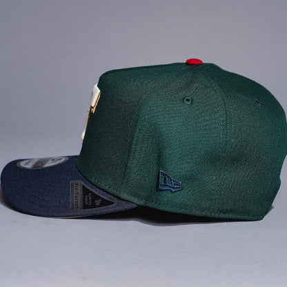 NEW ERA 9FIFTY A-FRAME FOREST GREEN/NAVY TEXAS RANGERS SNAPBACK W/ 2020 INAUGURAL SEASON SIDE PATCH
