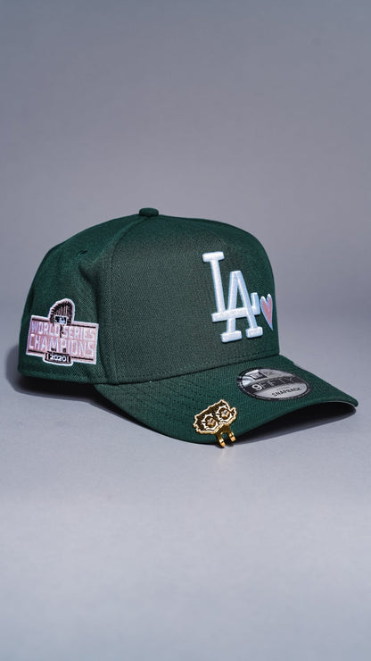 NEW ERA 9FIFTY A-FRAME FOREST GREEN LOS ANGELES DODGERS SNAPBACK W/ HEART + WORLD SERIES CHAMPIONS SIDE PATCH