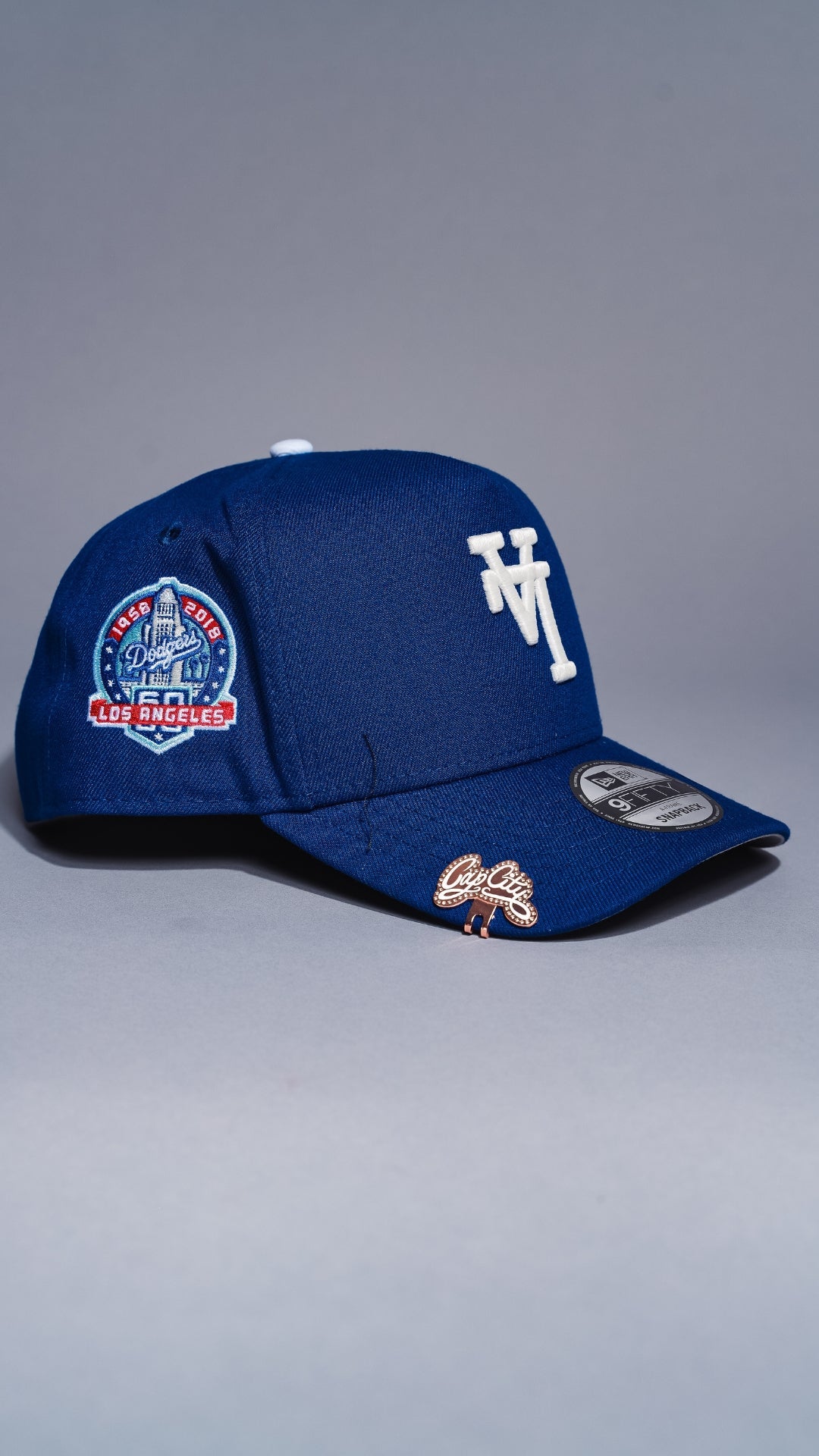 NEW ERA 9FIFTY A-FRAME BLUE UPSIDE DOWN LOS ANGELES DODGERS SNAPBACK W/ 60TH ANNIVERSARY SIDE PATCH