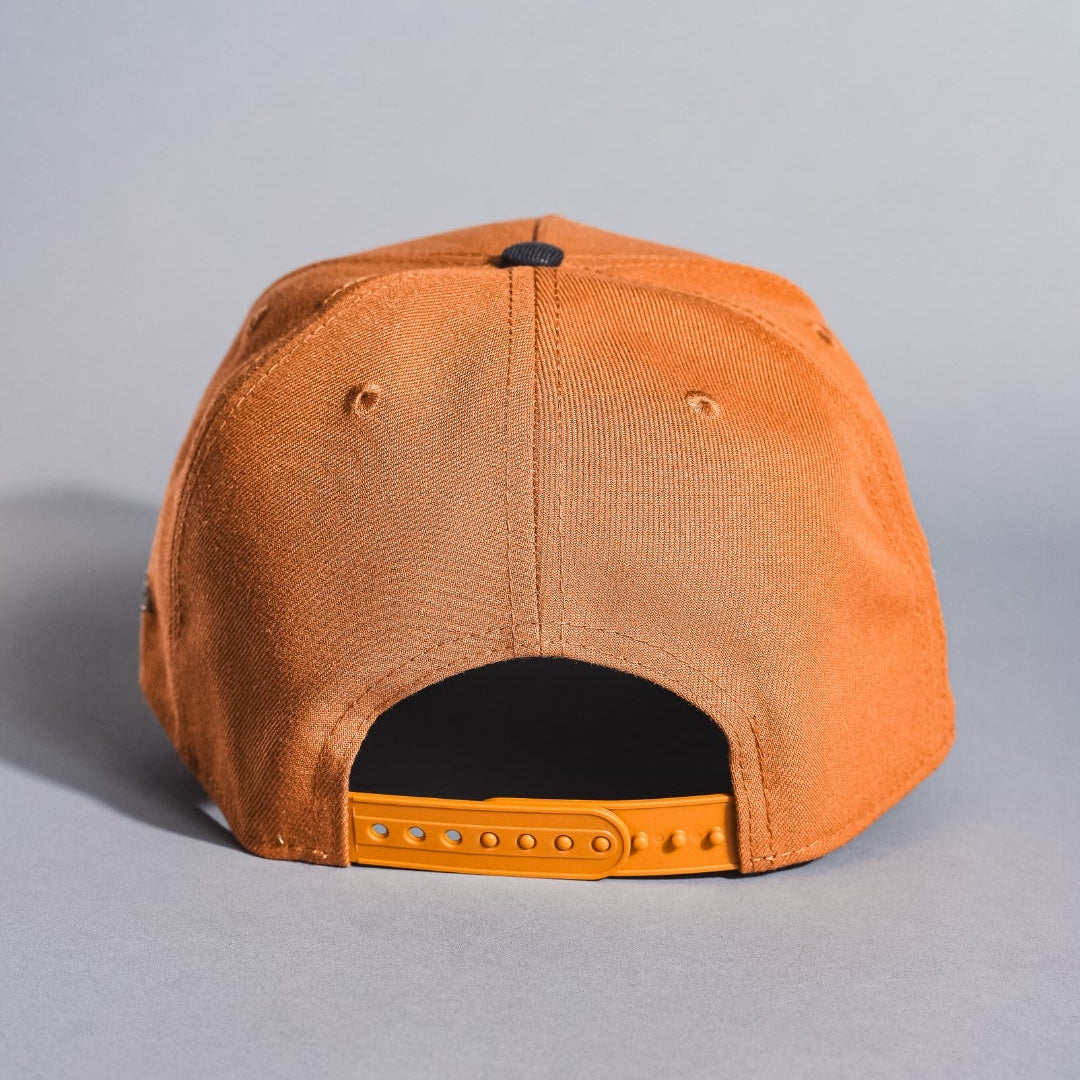 NEW ERA 9FIFTY A-FRAME TAN/BLACK ATLANTA BRAVES SNAPBACK W/ 1995 WORLD SERIES SIDE PATCH