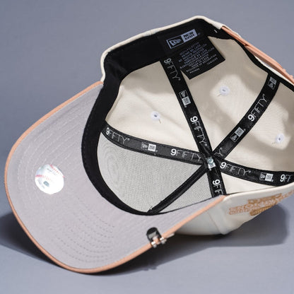 NEW ERA 9FIFTY A-FRAME CHROME/BEIGE LOS ANGELES DODGERS W/ WORLD CHAMPIONSIDE PATCH