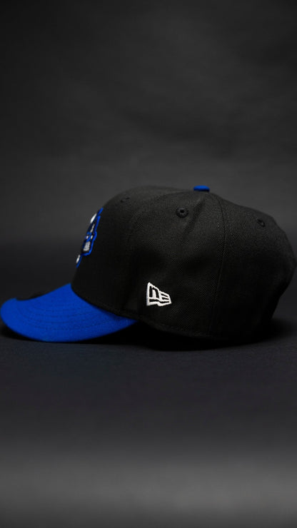 NEW ERA EXCLUSIVE 9FIFTY BLACK/BLUE ATLANTA BRAVES SNAPBACK W/ ANNIVERSARY SIDE PATCH