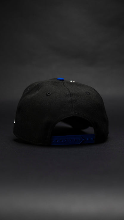 NEW ERA EXCLUSIVE 9FIFTY BLACK/BLUE ATLANTA BRAVES SNAPBACK W/ ANNIVERSARY SIDE PATCH