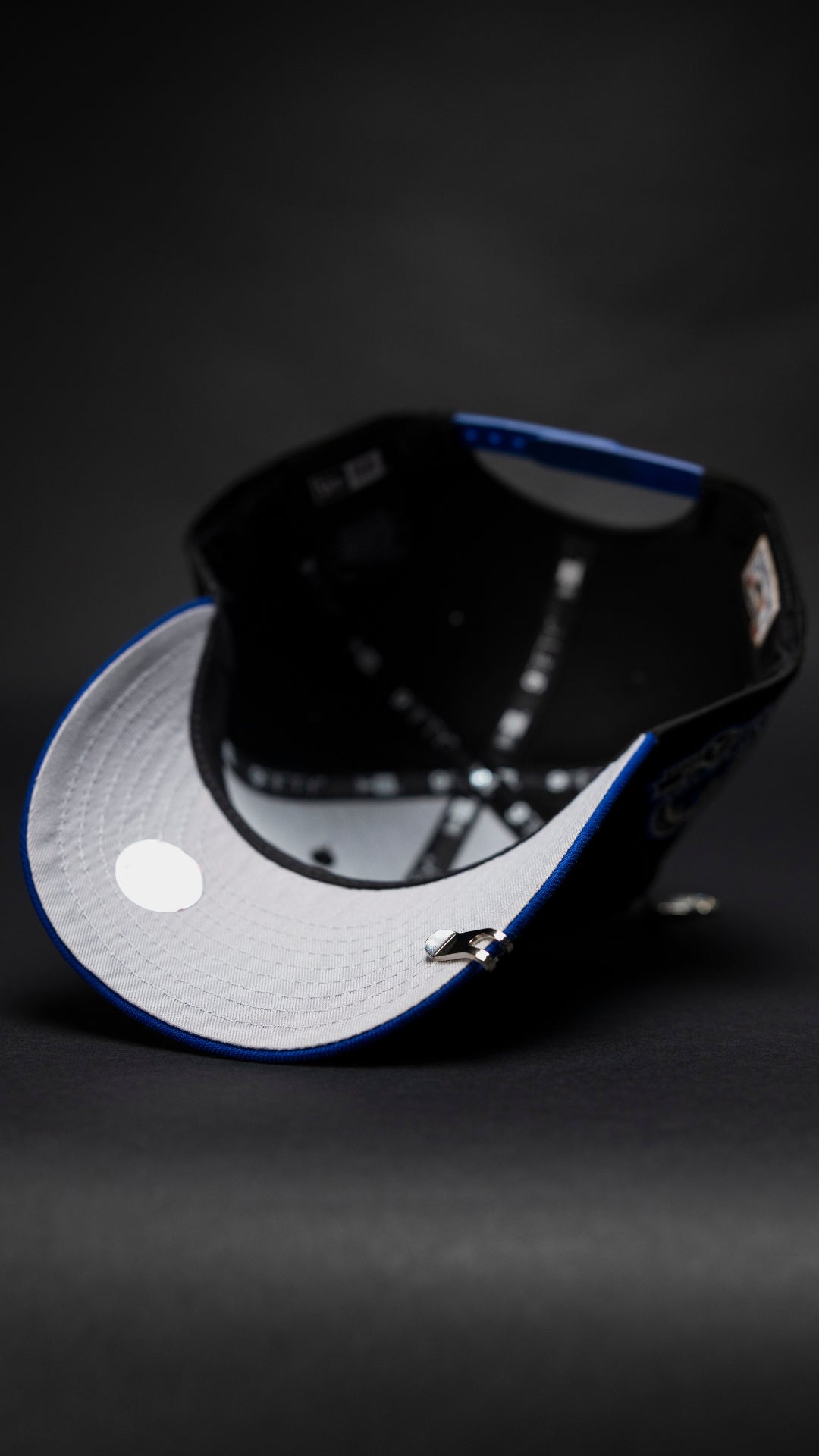 NEW ERA EXCLUSIVE 9FIFTY BLACK/BLUE ATLANTA BRAVES SNAPBACK W/ ANNIVERSARY SIDE PATCH