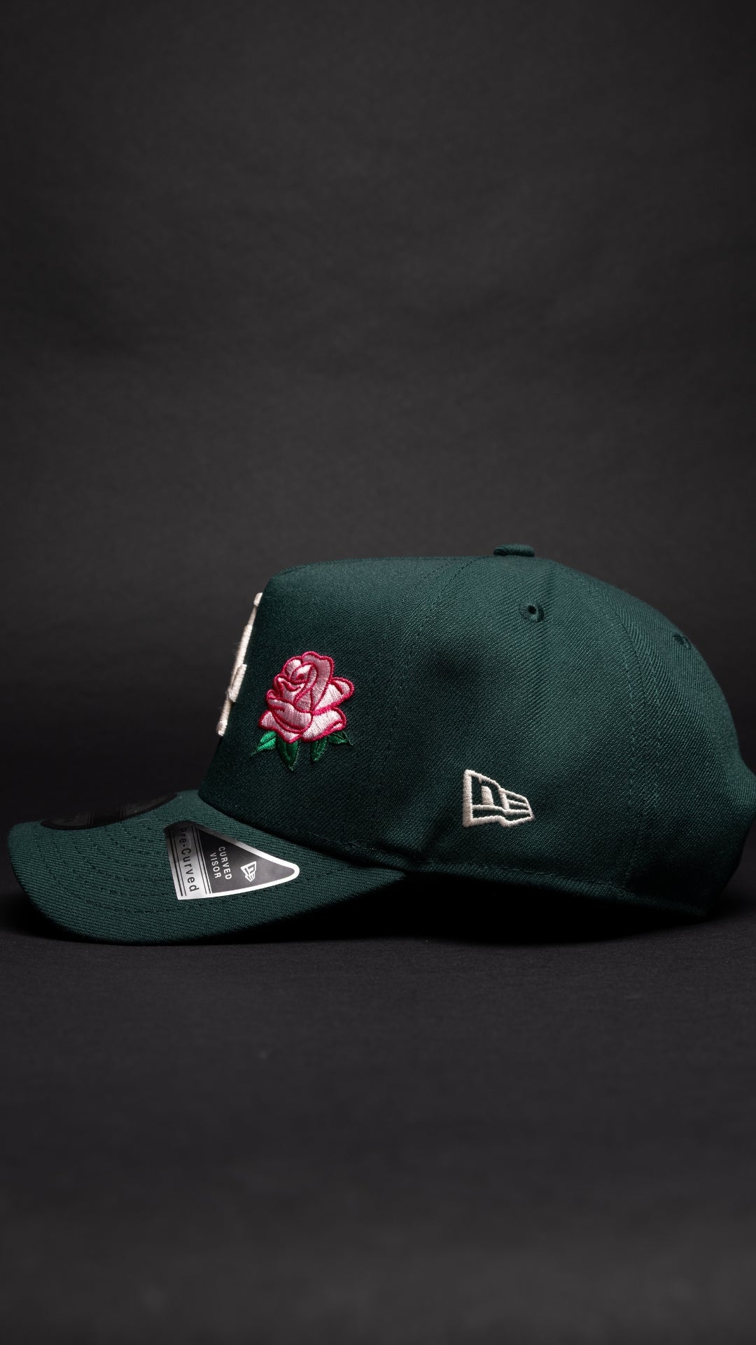 NEW ERA 9FIFTY A-FRAME FOREST GREEN LOS ANGELES DODGERS W/ PINK ROSE + WORLD SERIES CHAMPIONS SIDE PATCH