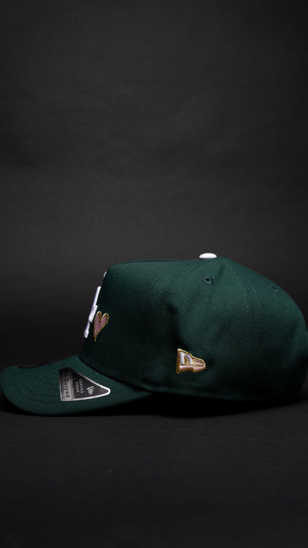NEW ERA 9FIFTY A-FRAME FOREST GREEN LOS ANGELES DODGERS W/ PINK HEART + 50TH ANNIVERSARY SIDE PATCH