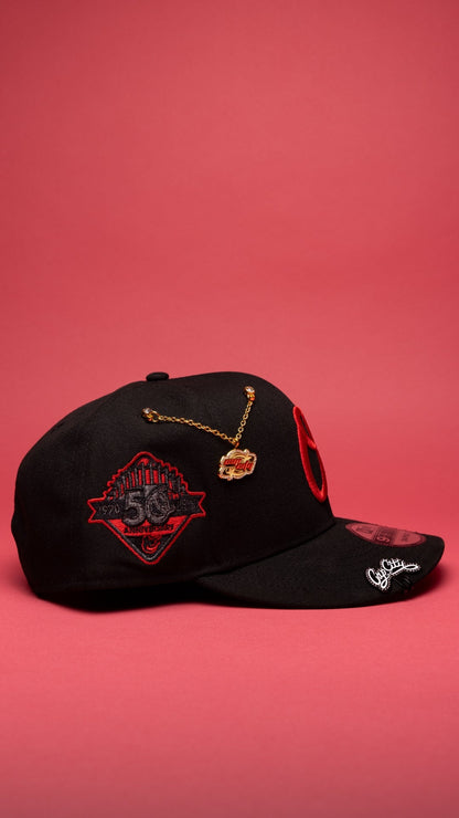 NEW ERA EXCLUSIVE 9FIFTY BLACK BALTIMORE ORIOLES SNAPBACK W/ 50TH ANNIVERSARY SIDE PATCH