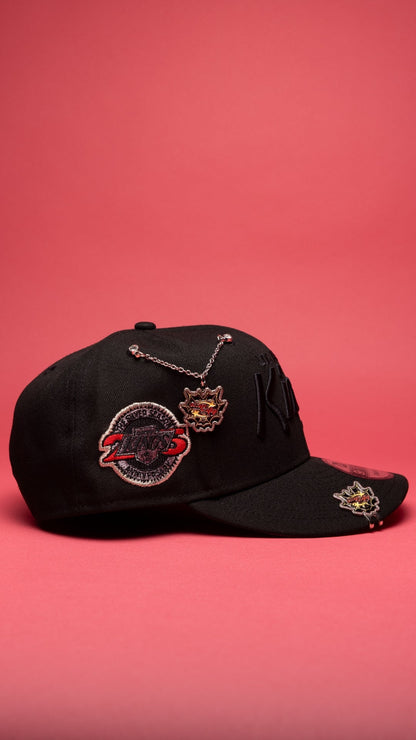 NEW ERA EXCLUSIVE 9FIFTY BLACKED OUT LOS ANGELES KINGS SCRIPT SNAPBACK W/ 25TH ANNIVERSARY SIDE PATCH
