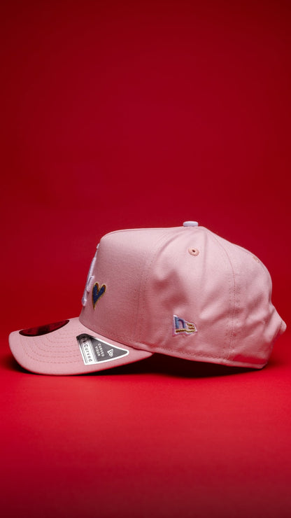NEW ERA 9FIFTY A-FRAME PINK LOS ANGELES DODGERS W/ ICY HEART + 50TH ANNIVERSARY SIDE PATCH