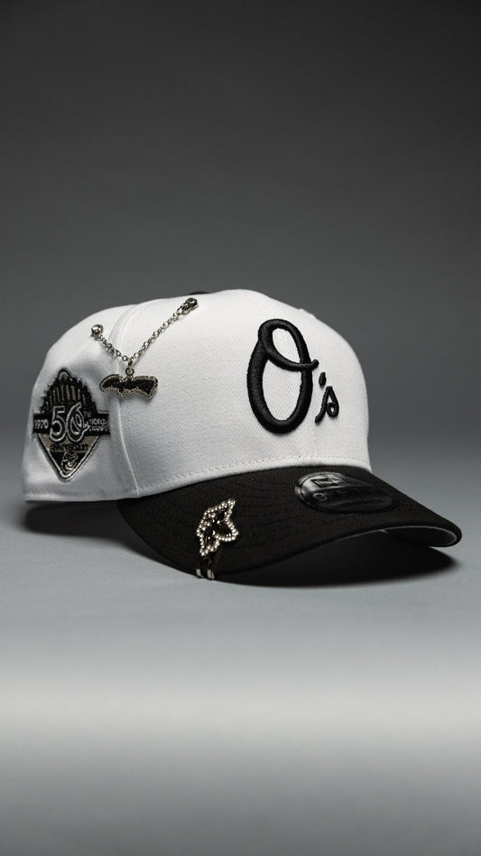 NEW ERA EXCLUSIVE 9FIFTY PEARL WHITE BALTIMORE ORIOLES SNAPBACK W/ 50TH ANNIVERSARY SIDE PATCH