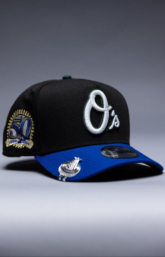 NEW ERA 9FIFTY A-FRAME BLACK/BLUE BALTIMORE ORIOLES SNAPBACK W/ 1989 WORLD SERIES SIDE PATCH