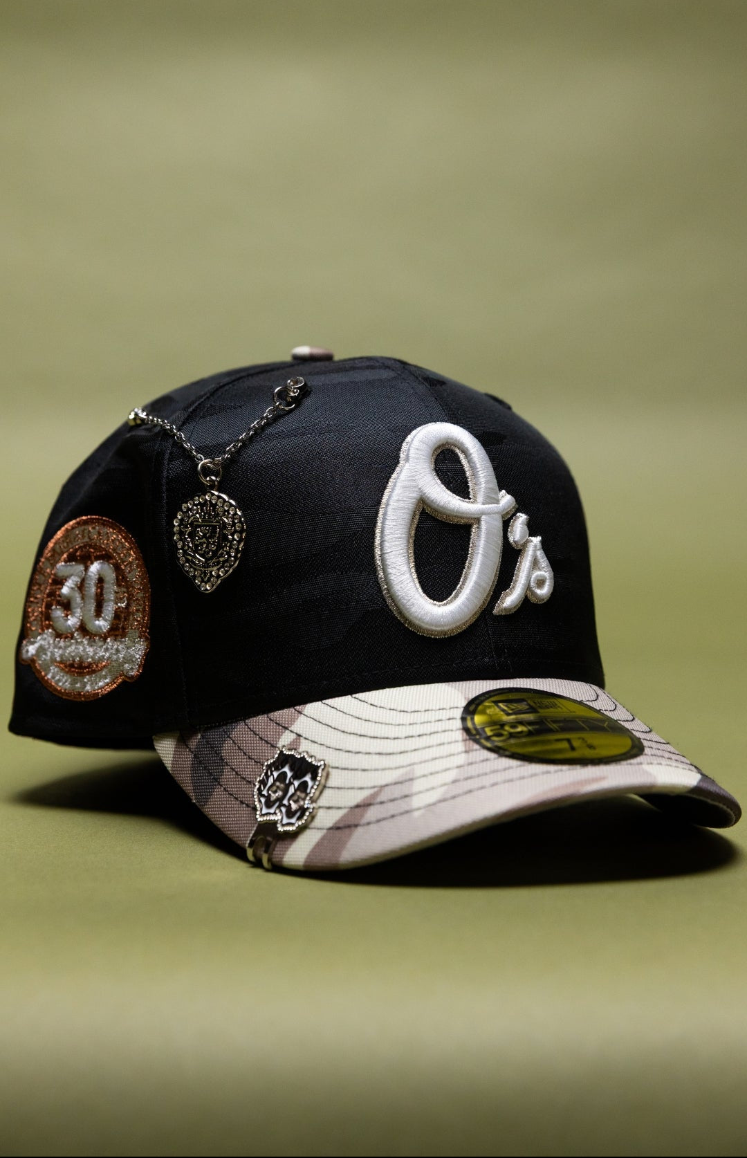 NEW ERA EXCLUSIVE 59FIFTY BLACK CAMO BALTIMORE ORIOLES W/ 30TH ANNIVERSARY SIDE PATCH