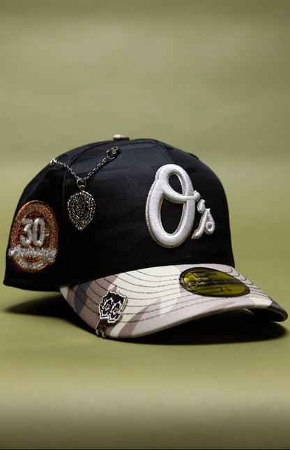 NEW ERA EXCLUSIVE 59FIFTY BLACK CAMO BALTIMORE ORIOLES W/ 30TH ANNIVERSARY SIDE PATCH