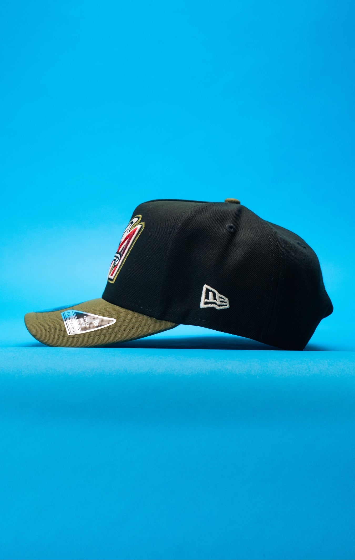 NEW ERA 9FIFTY A-FRAME BLACK/OLIVE ANAHEIM ANGELS SNAPBACK W/ 50TH ANNIVERSARY SIDE PATCH