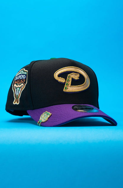 NEW ERA 9FIFTY A-FRAME BLACK/PURPLE ARIZONA DIAMONDBACKS SNAPBACK W/ 1998 INAUGURAL SEASON SIDE PATCH