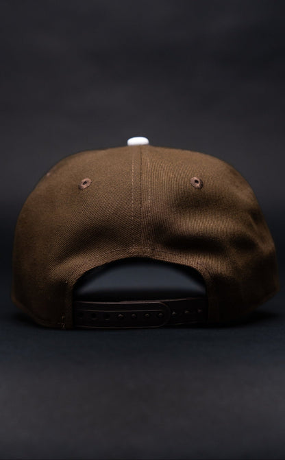 NEW ERA 9FIFTY A-FRAME BROWN BALTIMORE ORIOLES SNAPBACK W/ 25TH ANNIVERSARY SIDE PATCH
