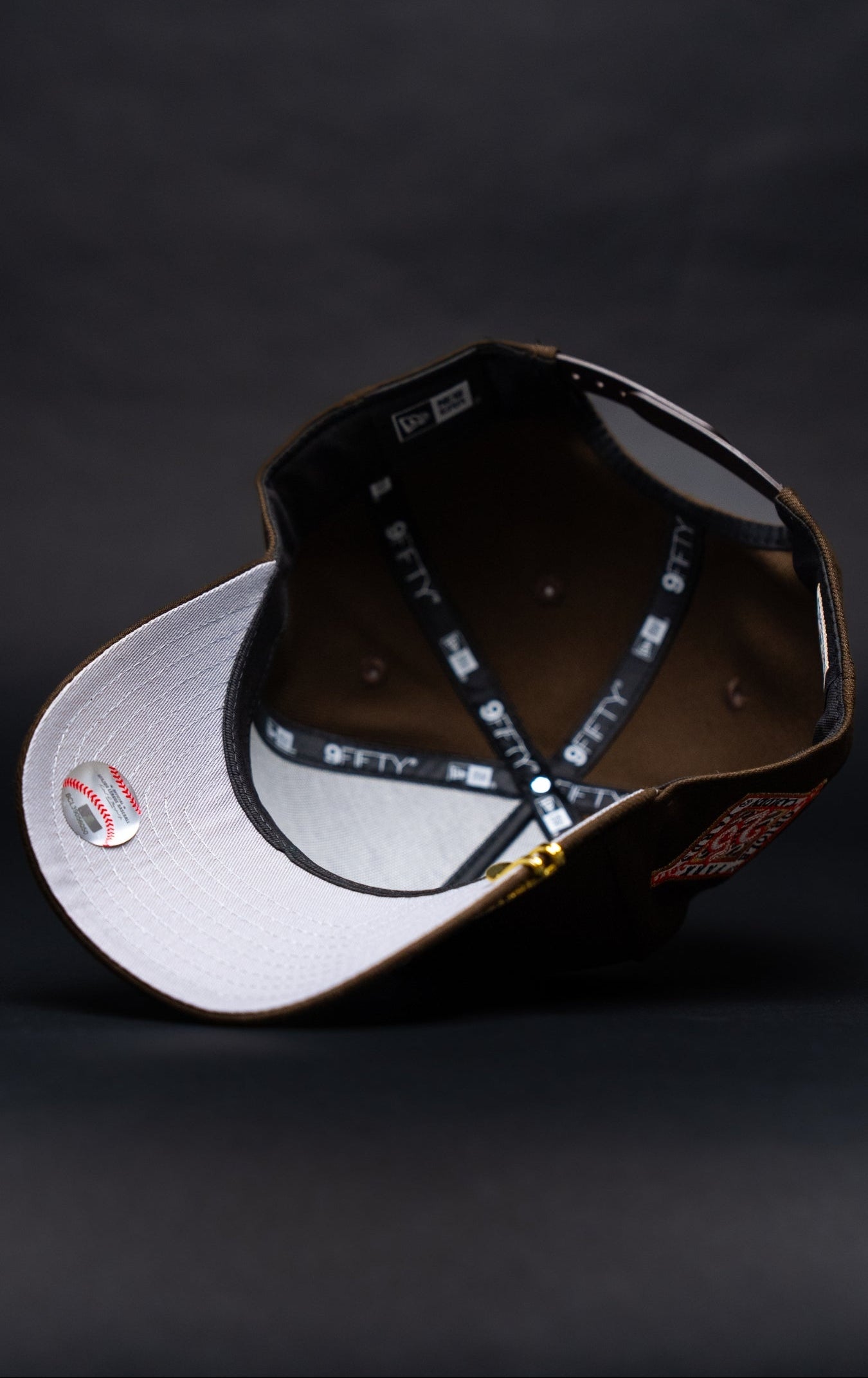 NEW ERA 9FIFTY A-FRAME BROWN BALTIMORE ORIOLES SNAPBACK W/ 25TH ANNIVERSARY SIDE PATCH