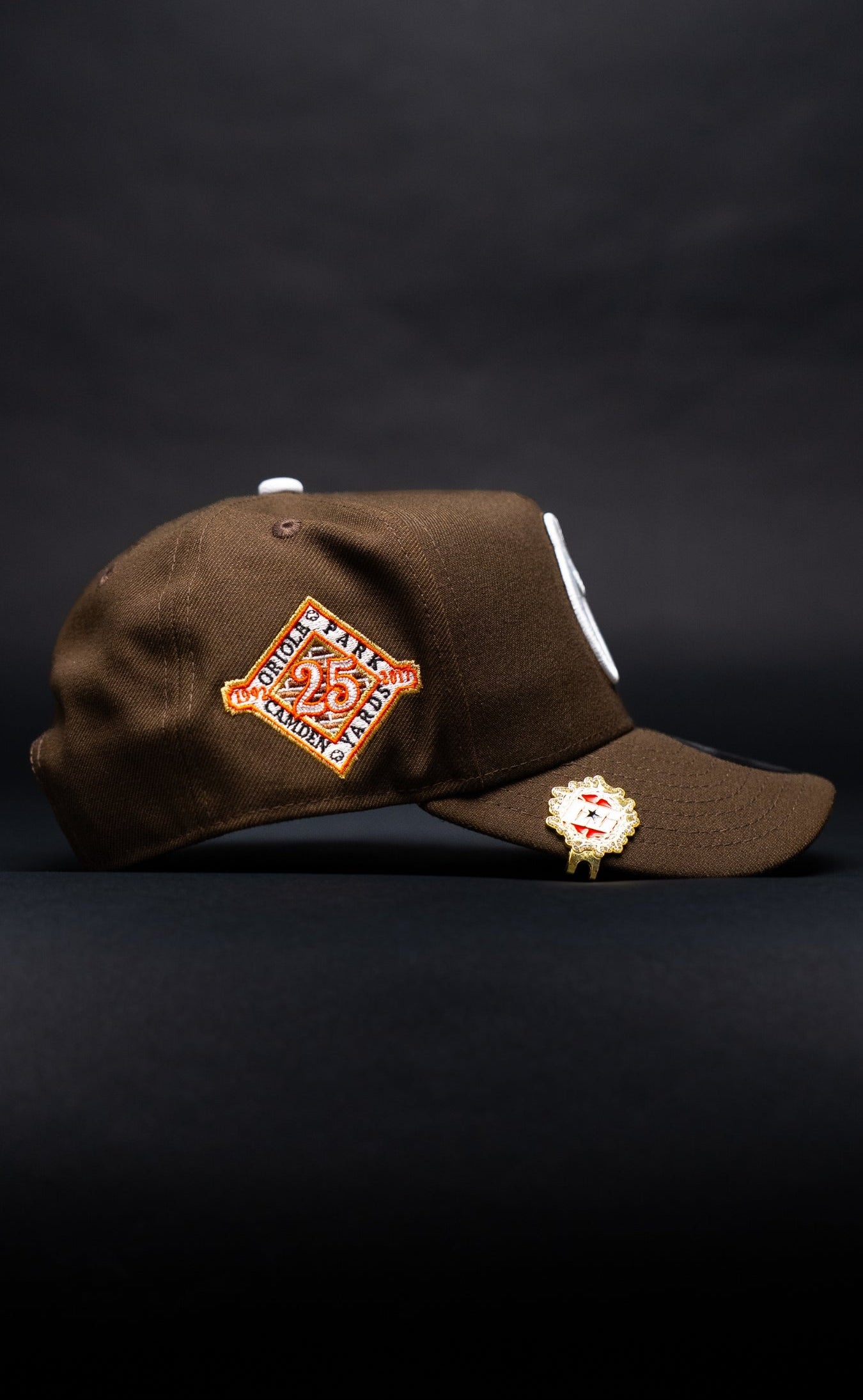 NEW ERA 9FIFTY A-FRAME BROWN BALTIMORE ORIOLES SNAPBACK W/ 25TH ANNIVERSARY SIDE PATCH
