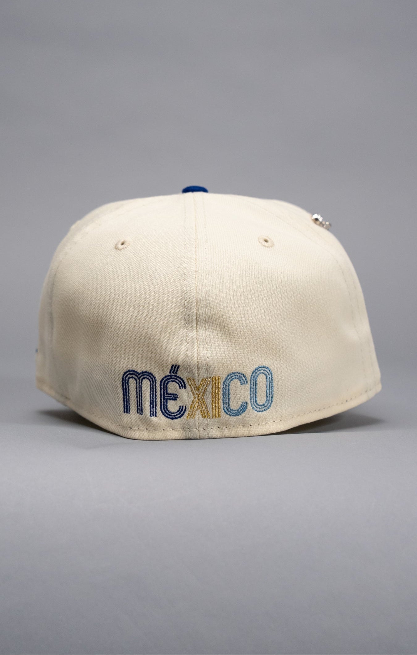NEW ERA EXCLUSIVE 59FIFTY CHROME/BLUE MEXICO 2025 WORLD BASEBALL CLASSIC W/ MEXICO FLAG SIDE PATCH