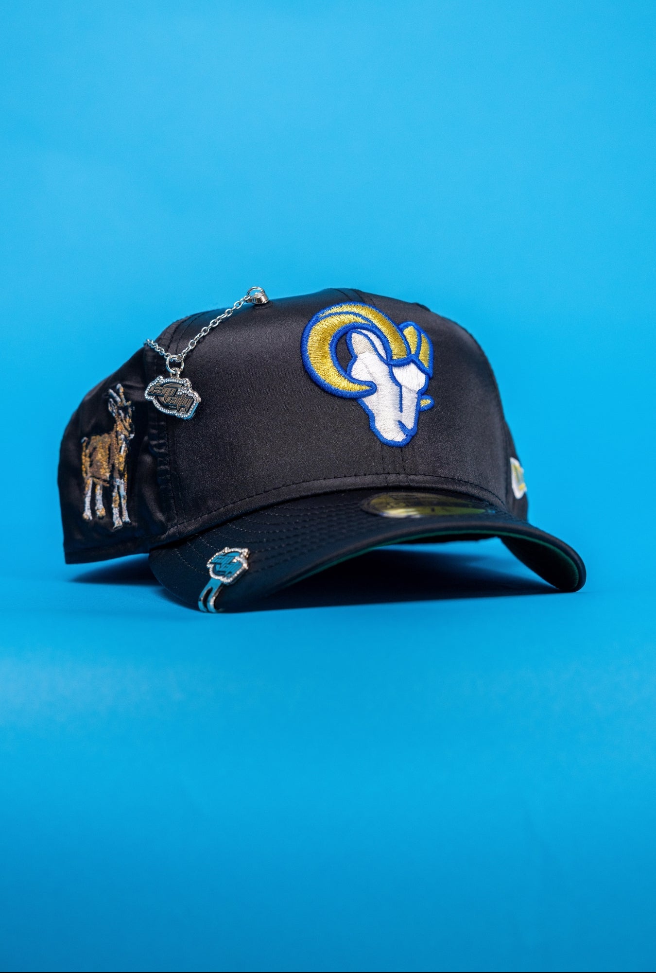 NEW ERA EXCLUSIVE 59FIFTY SATIN LOS ANGELES RAMS W/ GOAT SIDE PATCH