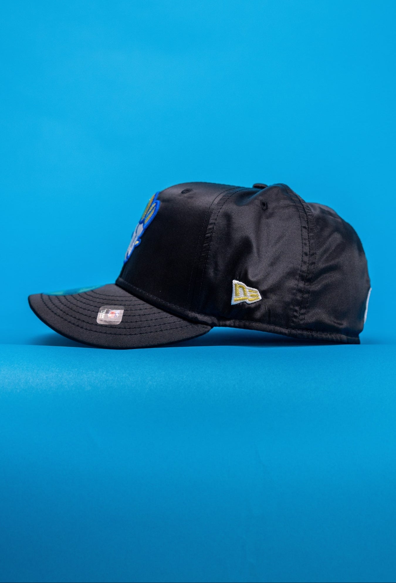 NEW ERA EXCLUSIVE 59FIFTY SATIN LOS ANGELES RAMS W/ GOAT SIDE PATCH