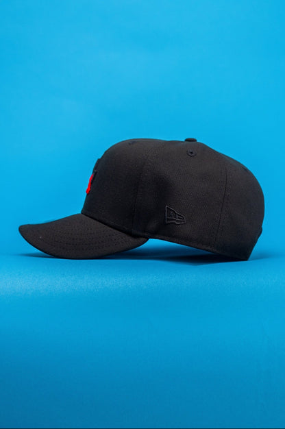 NEW ERA EXCLUSIVE 9FIFTY BLACK LOS ANGELES DODGERS SNAPBACK W/ "LA BLEEDS BLUE" SIDE PATCH