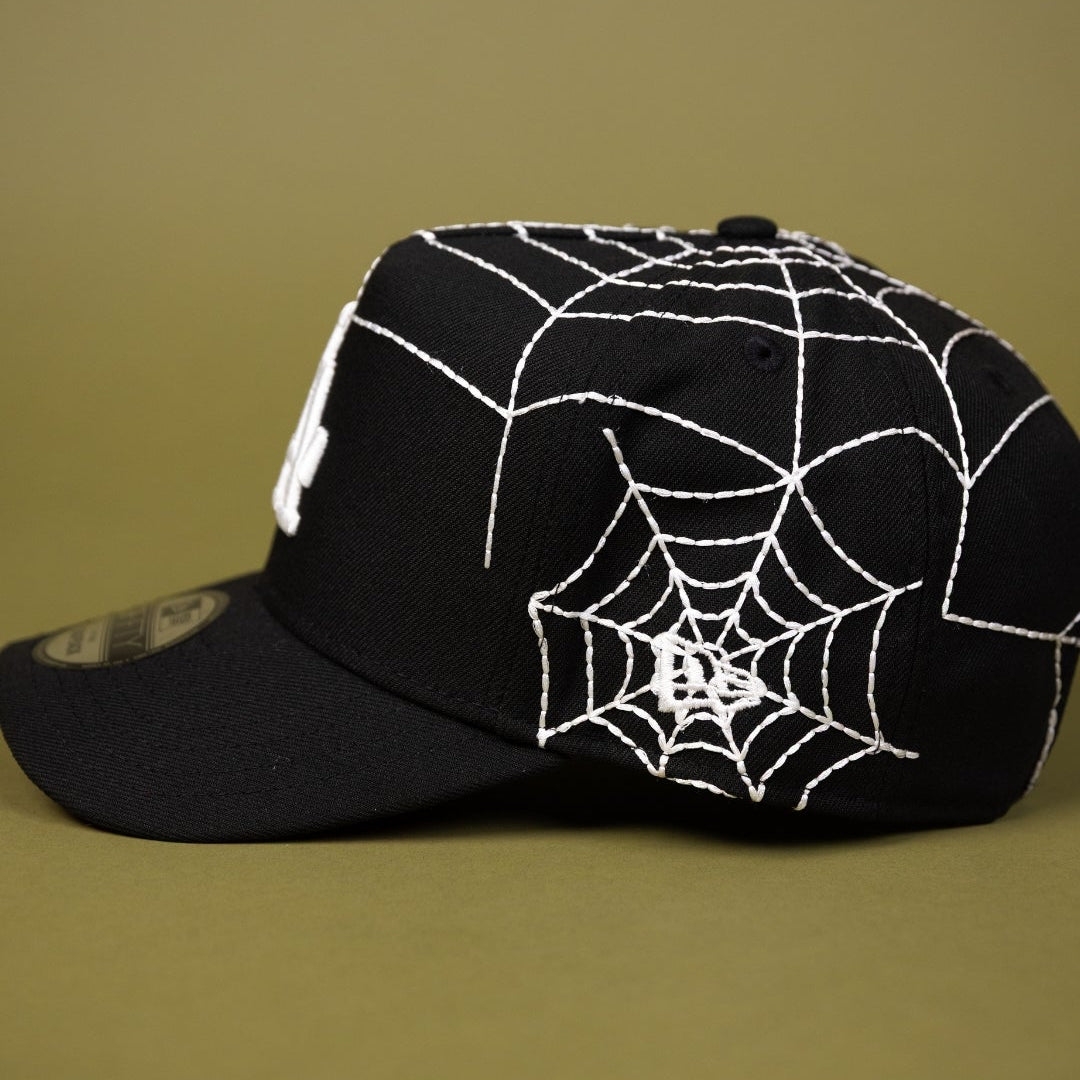 NEW ERA EXCLUSIVE 9FIFTY A-FRAME BLACK LOS ANGELES DODGERS SNAPBACK W/ SPIDER WEB + WORLD SERIES CHAMPIONS SIDE PATCH