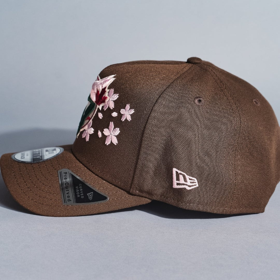 NEW ERA 9FIFTY A-FRAME BROWN TORONTO BLUE JAYS SNAPBACK W/ FLORAL EMBROIDERY + WORLD SERIES SIDE PATCH