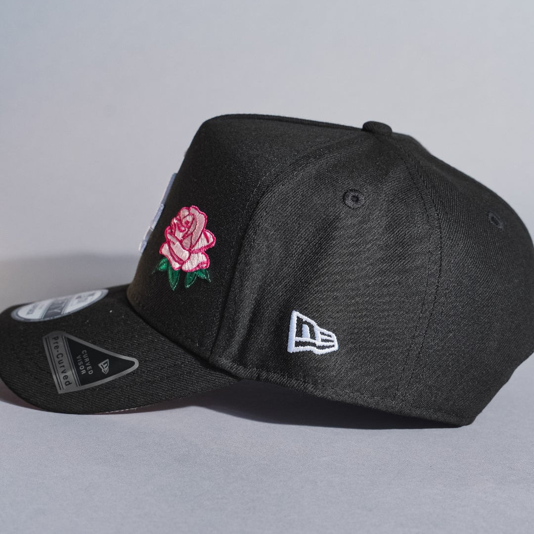 NEW ERA 9FIFTY A-FRAME BLACK LOS ANGELES DODGERS SNAPBACK W/ PINK ROSE + 50TH ANNIVERSARY SIDE PATCH