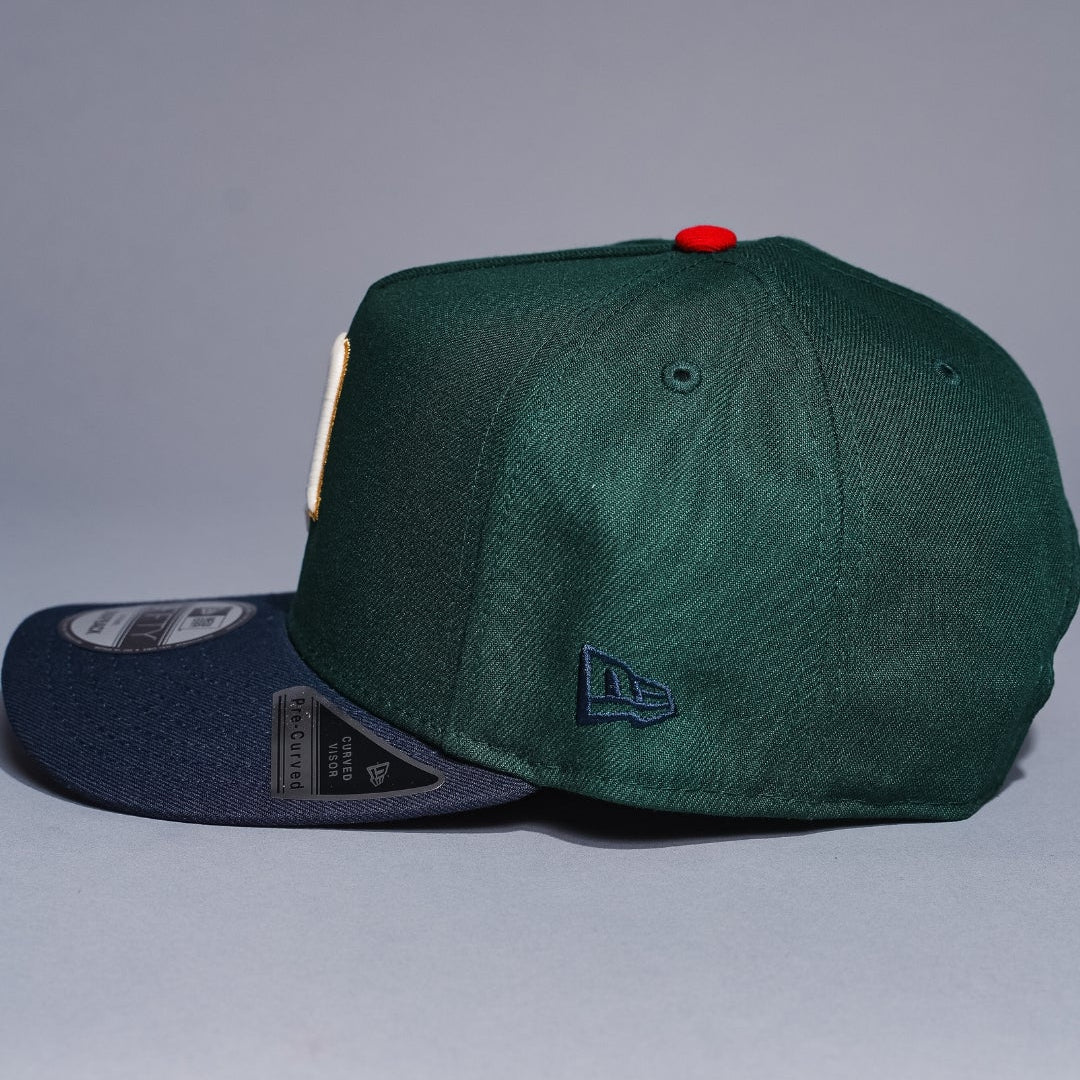 NEW ERA 9FIFTY A-FRAME FOREST GREEN/NAVY MINNESOTA TWINS SNAPBACK W/ALL STAR GAME SIDE PATCH