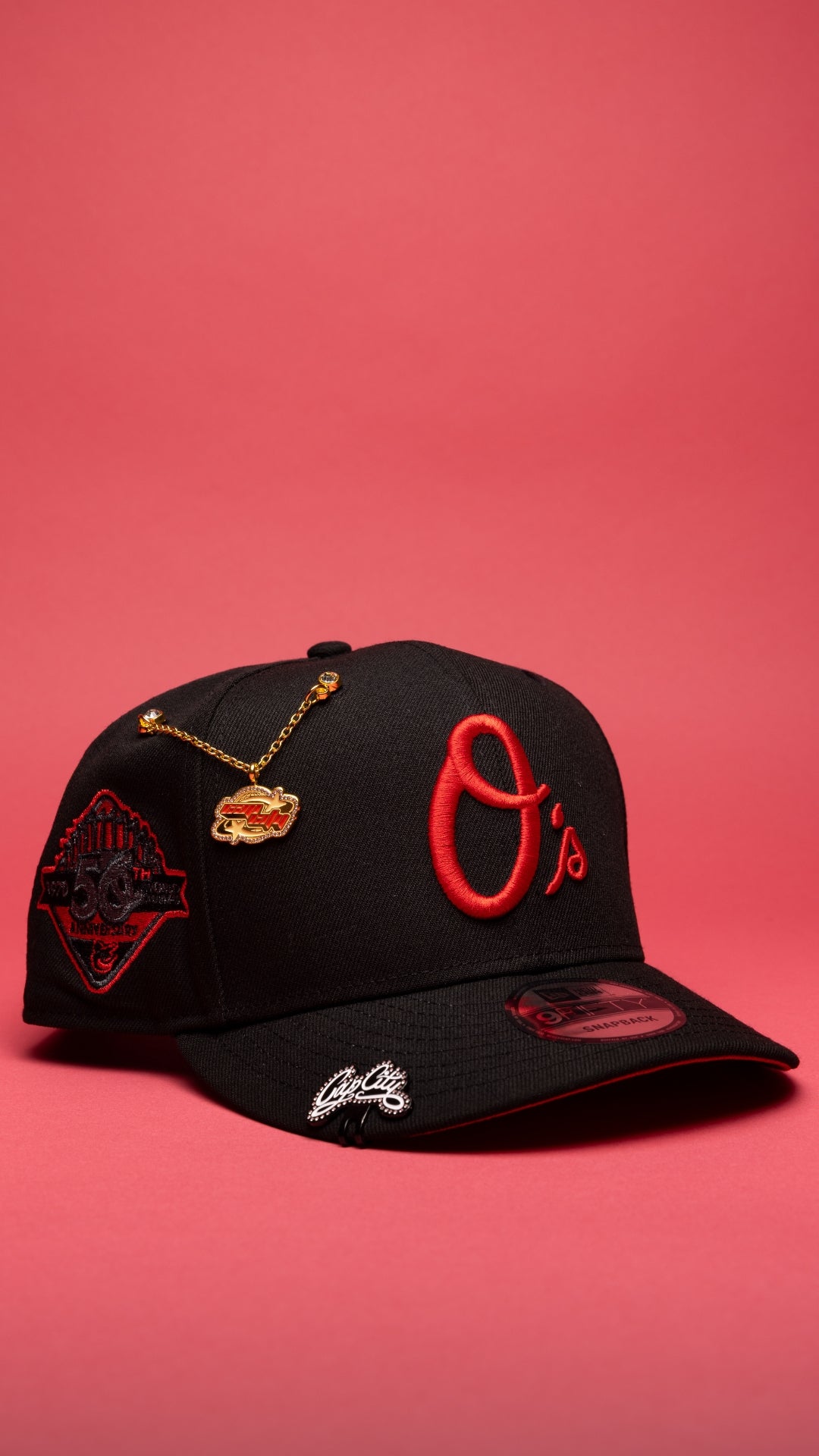 NEW ERA EXCLUSIVE 9FIFTY BLACK BALTIMORE ORIOLES SNAPBACK W/ 50TH ANNIVERSARY SIDE PATCH